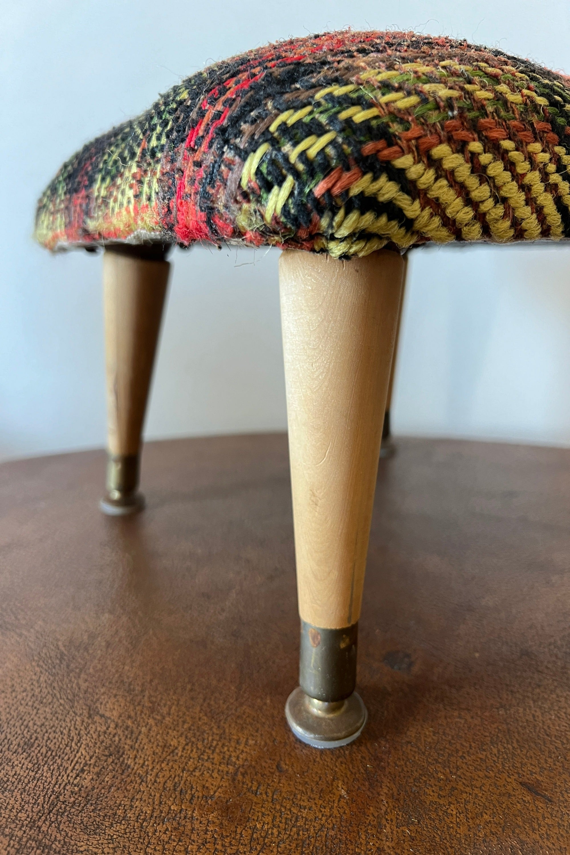 District Loom Furniture Classic Mid Century Modern plaid upholstered foot stool with wood & brass-accented legs