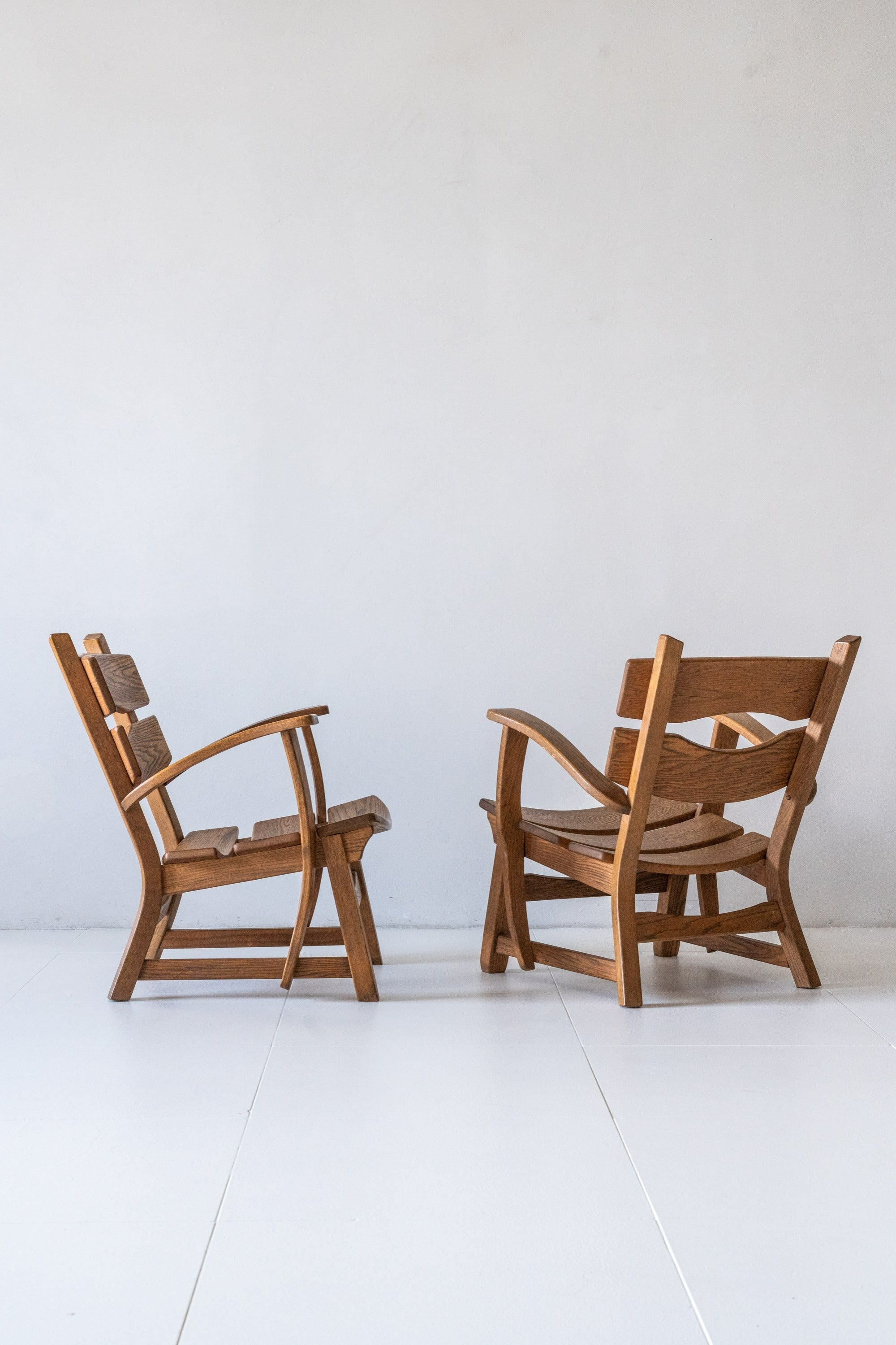 District Loom Furniture Pair Brutalist Oak Lounge Chairs by Dittman and Co.