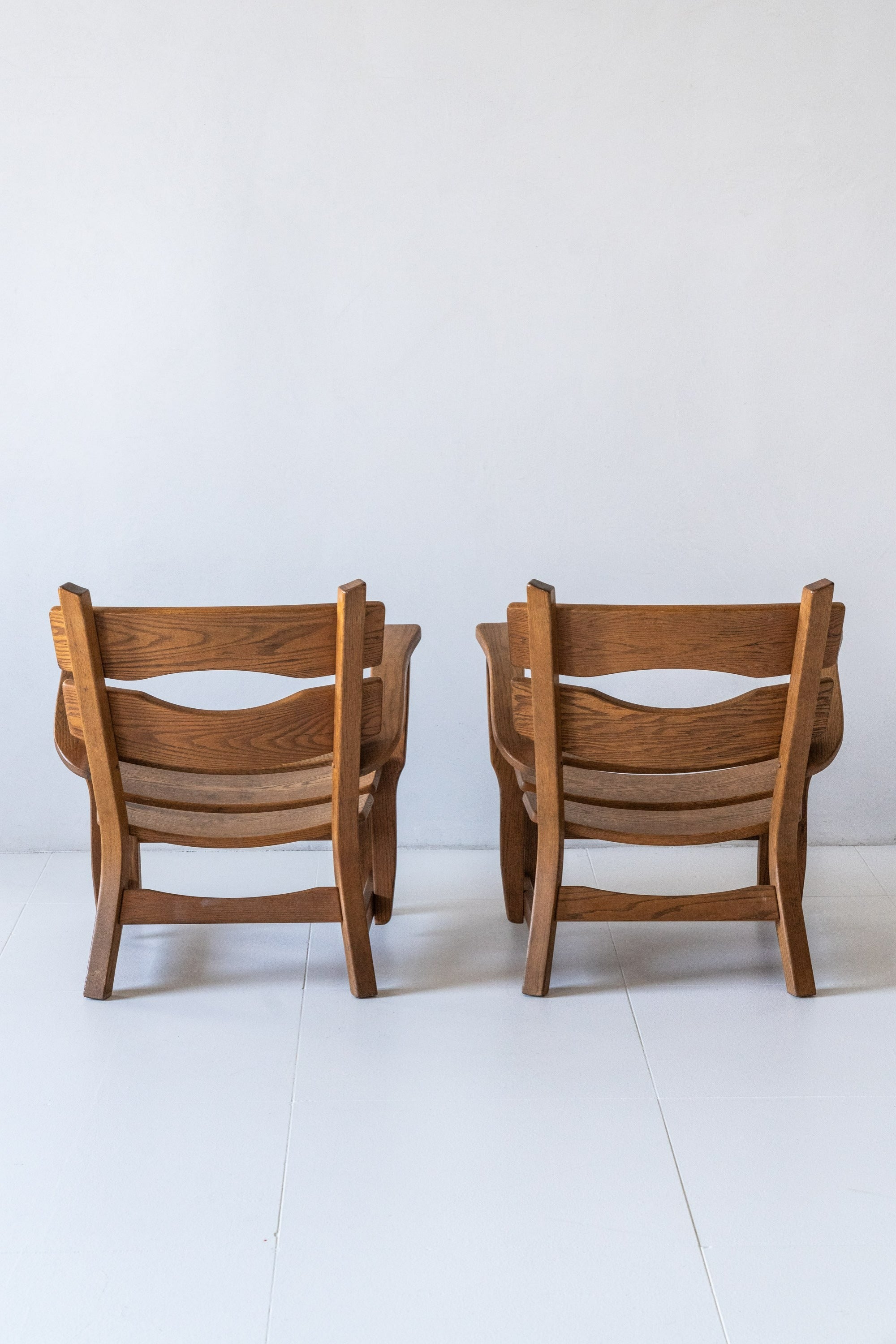 District Loom Furniture Pair Brutalist Oak Lounge Chairs by Dittman and Co.