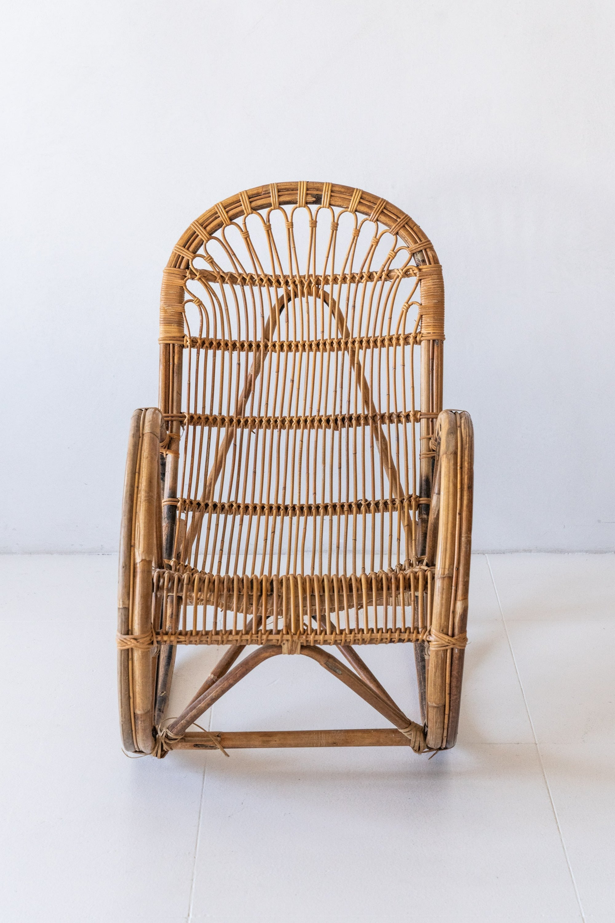 District Loom Furniture Vintage Rattan Loop Rocking Chair