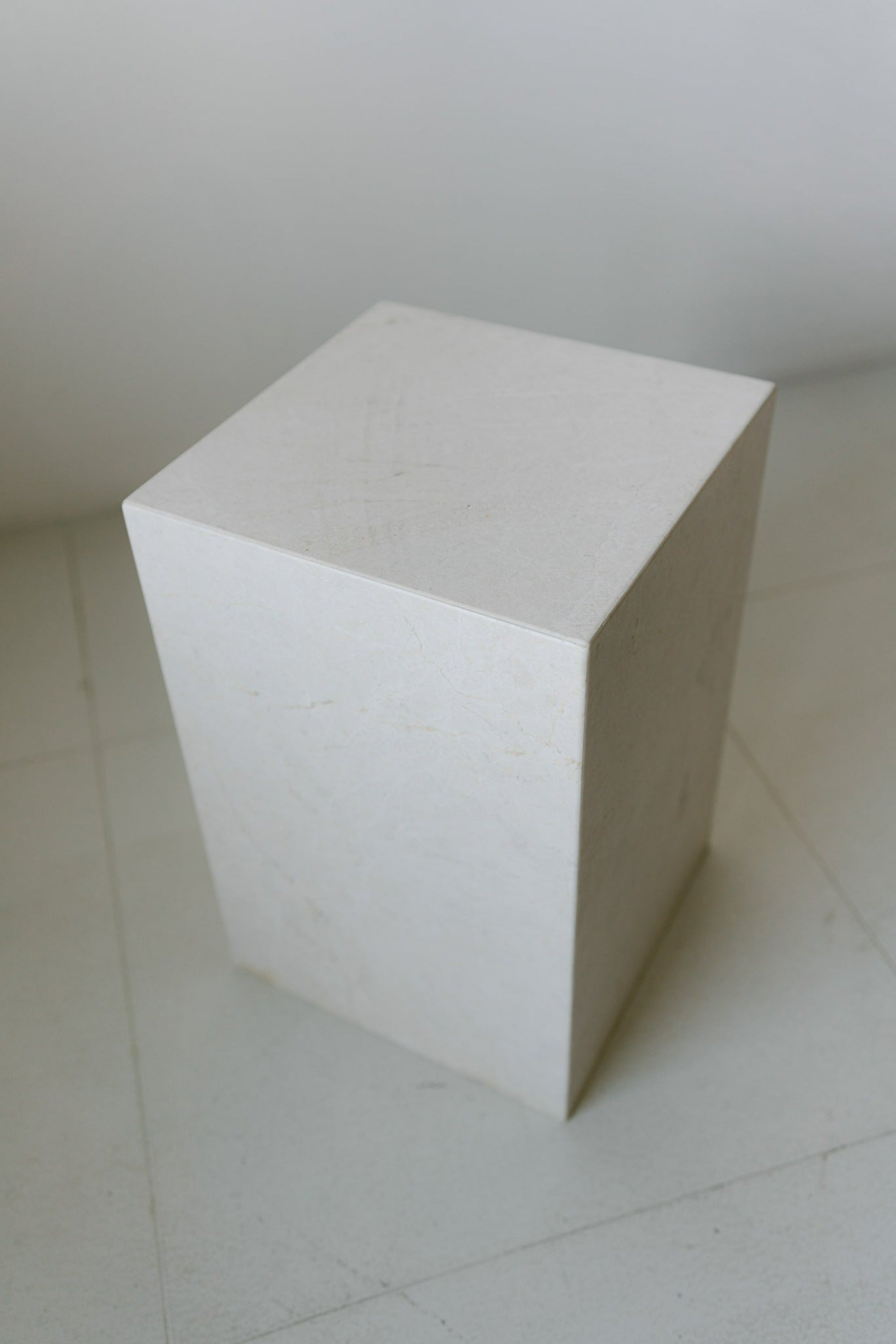 District Loom Furniture Mosa White marble plinth pedestal locally sourced from stone remnants and hand crafted to serve as a sustainable sculptural element in your home 001