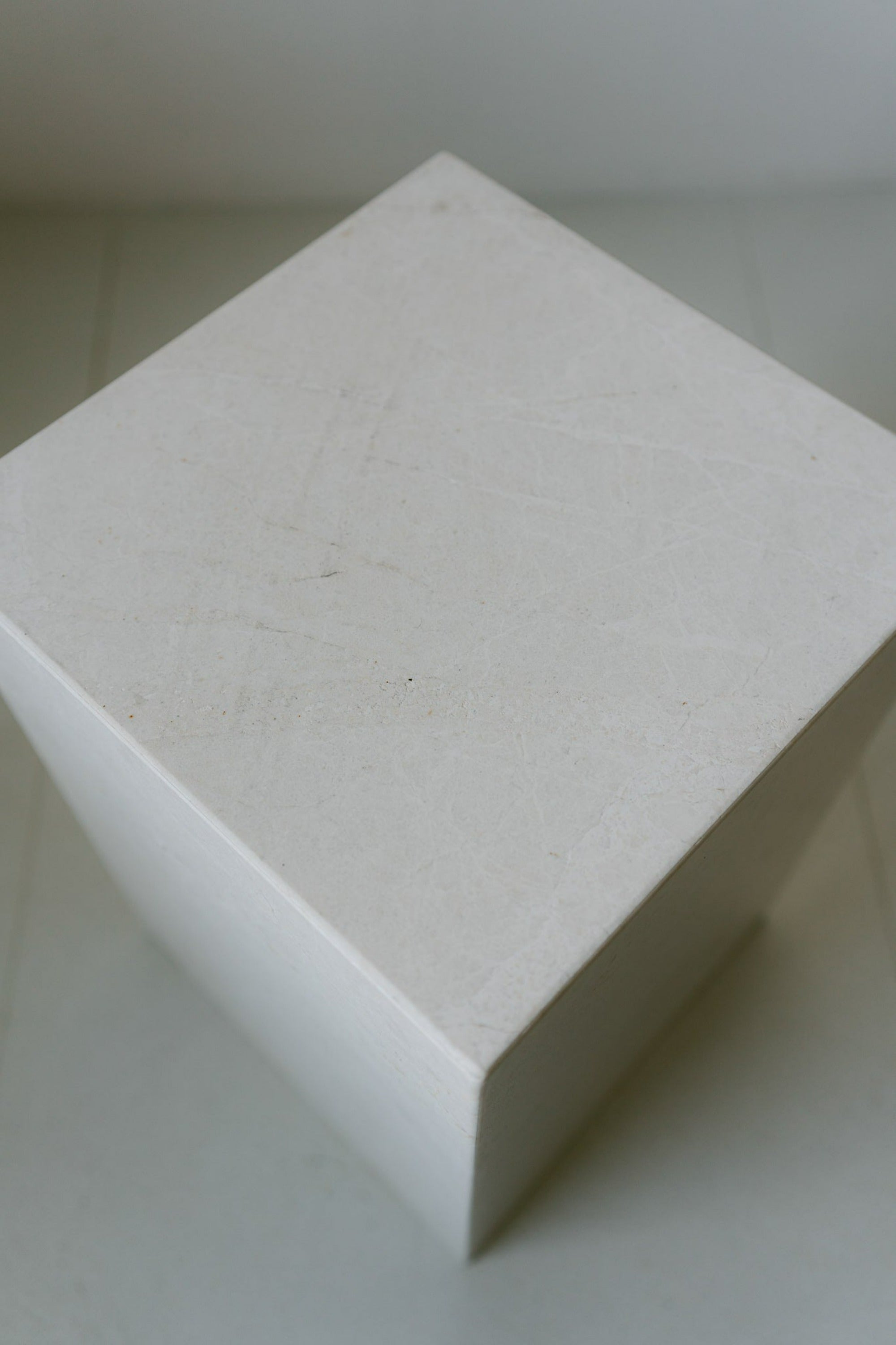 District Loom Furniture Mosa White marble plinth pedestal locally sourced from stone remnants and hand crafted to serve as a sustainable sculptural element in your home 001