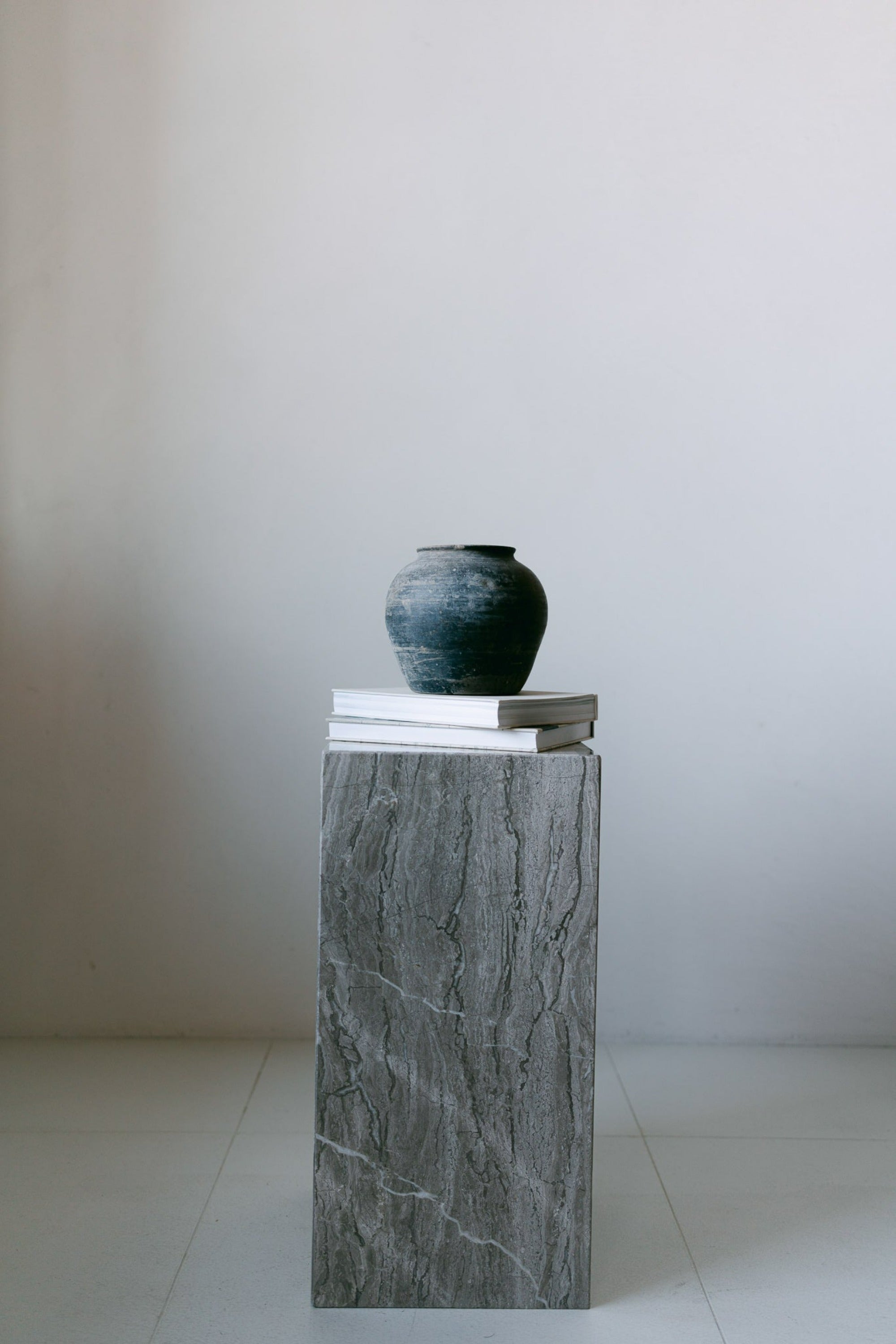 District Loom Furniture Silver Travertine stone plinth pedestal locally sourced from natural stone slab remnants and handcrafted to serve as a sustainable sculptural element in your home 006