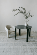 District Loom Furniture Nero Marquina Marble round table honed finish locally sourced from natural marble stone remnant and handcrafted to serve as a sustainable sculptural element in your home